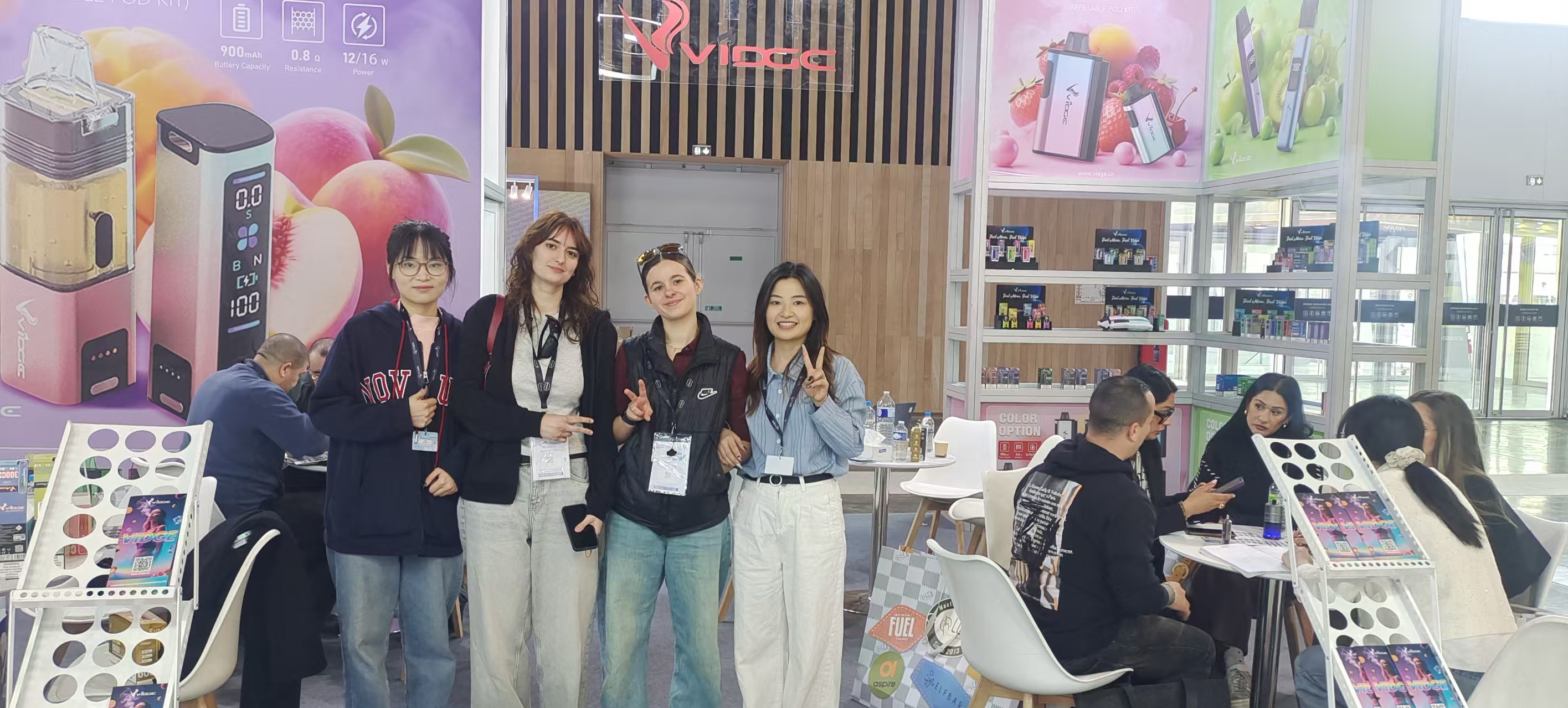VIDGE booth attracting a crowd interested in their latest disposable vapes in France.